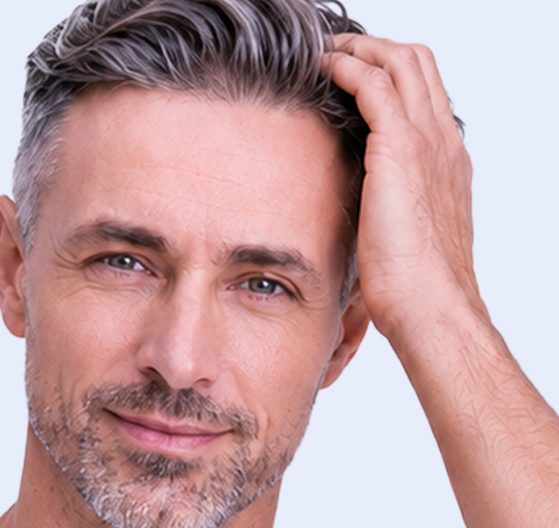 Man running his hand through his hair